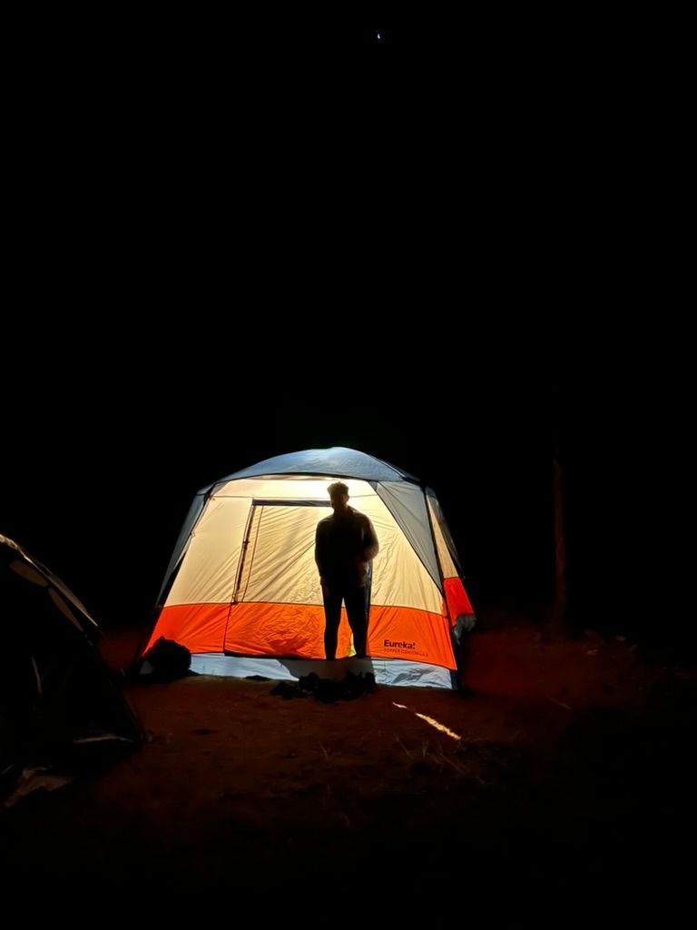 A picture of the tent shining in the night