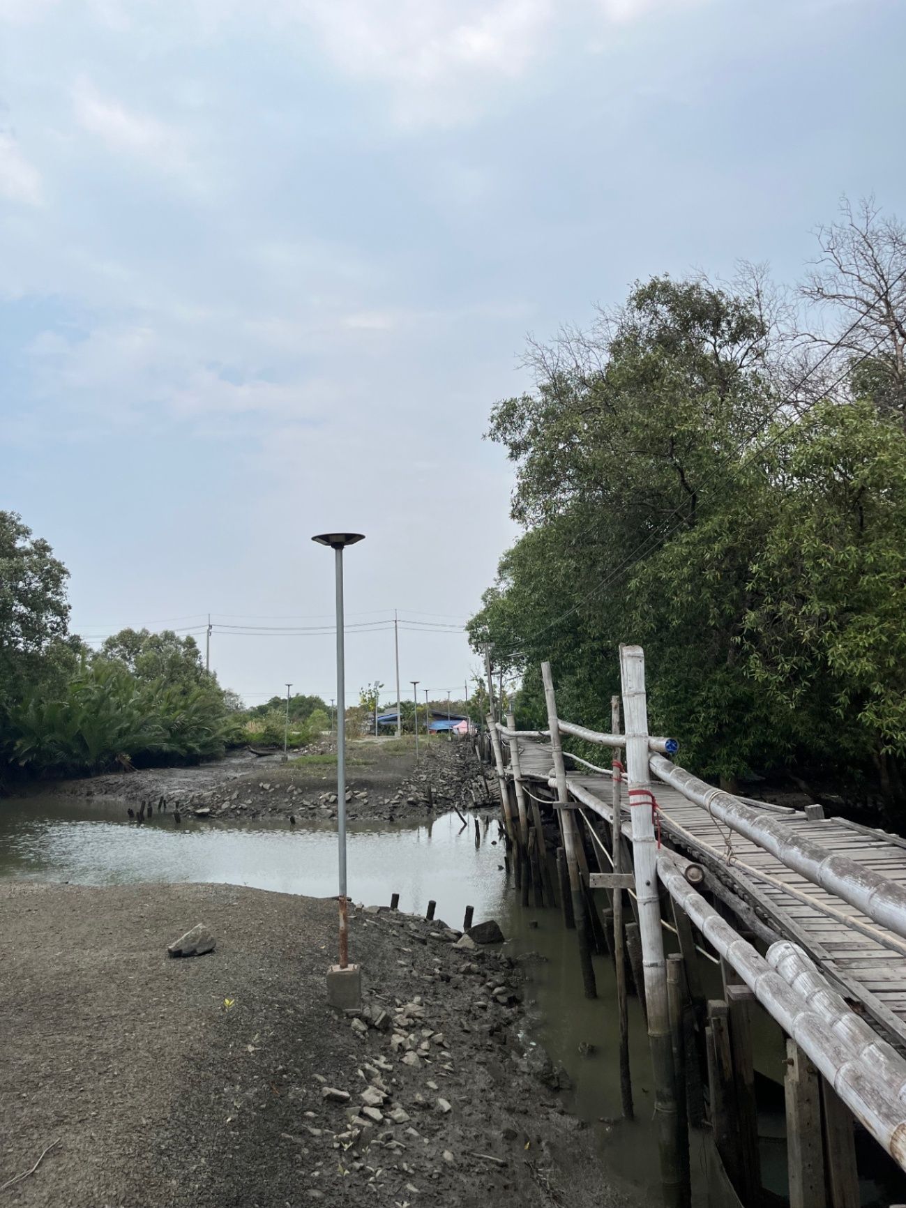 Busted bridge we cross by bike