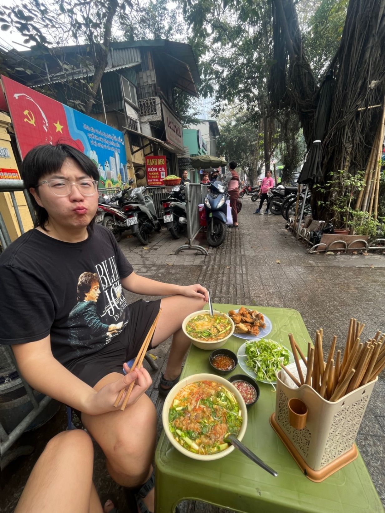 Grant and I eating yummy food in Hanoi