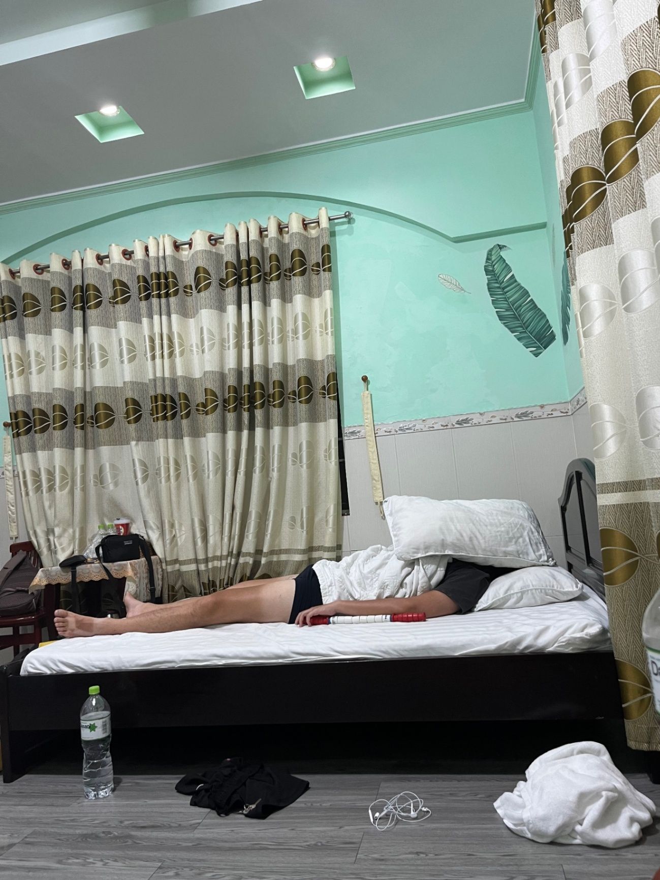 Grant lying dead on the bed